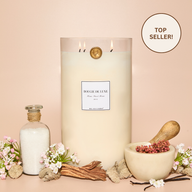 Lit Home Sweet Home Big Ass Candle with florals, vanilla and sugar surrounding it