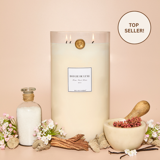 Lit Home Sweet Home Big Ass Candle with florals, vanilla and sugar surrounding it