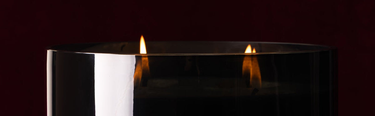 Top part of Valentine's Day candle with flames lit.