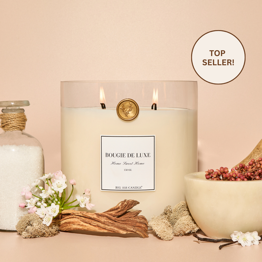 Big Ass Luxuries Home Sweet Home candle, organic coconut soy wax with pink pepper, sandalwood, creamy caramel, vanilla, and velvet musk for a cozy, welcoming fragrance.