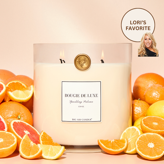 Big Ass Luxuries Sparkling Paloma candle, hand-poured with coconut soy wax and organic clean ingredients, a vibrant citrus blend of tangerine, grapefruit, peach, and lime sweetened with agave.
