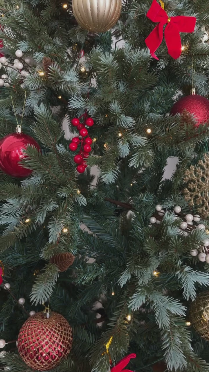 Holiday Ornament hanging on Christmas tree